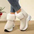 Stylish beige wedge snow boots for women with plush faux fur trim and thick soles. - Off White