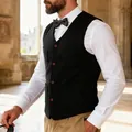 Close-up of a men's heavy wool-blend vest in charcoal with vintage patch pockets - S / Tops / Black