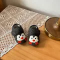 Detailed macro view of cute penguin design baby pre-walker shoes with soft warm fleece - 17 / Penguin