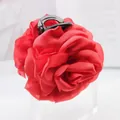 Close-up of elegant red satin rose flower hair claw clip with delicate fabric petals - 10cm Flower Claw / Red