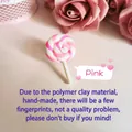 Detailed view of handmade pink polymer clay lollipop brooch for bags or clothes - Pink Lollipop Brooch
