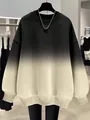 Detailed view of women's gradient oversized sweatshirt featuring ribbed cuffs and hem - S / Tops / Apricot