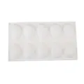 Detailed view of 10-cavity mango-shaped white silicone mold for baking - White Bagged Approx 115g