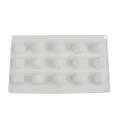 Detail macro view of white 15-cavity round silicone mold for chocolate and cake - 15 Cavity Round Style (G-34) / 115g Bagged