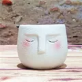 Detailed view of white textured ceramic face flower pot with pink blush accents - Small (6.5*6.5cm) / Off White
