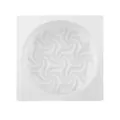 Detailed macro view of the spiral pattern inside a white silicone mousse cake mold. - Bagged approx 110g