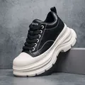 Men's platform sneaker in black and white with 10cm thick sole and soft leather upper. - 42 / Black