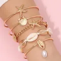 Juego de pulseras bohemias con estrellas de mar doradas, conchas y perlas falsas. - Juego de Conchas de Estrella de Mar (AB349)