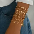Conjunto de pulseras de cadena dorada multicapa para mujer diseño vintage - Estilo de Siete Piezas Dorado (AB1200金)