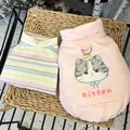 Detailed view of pink kitten-print pet vest with an integrated harness D-ring attachment - XS / Pink
