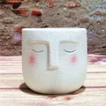 Macro view of white ceramic face flowerpot with coarse texture and cute closed eyes - Large (9.5*9.5cm) / Off White