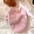 Close-up of soft pink fleece pet sweater featuring cute bear embroidery and checkered trim. - XS / Pink