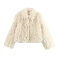 Close-up view of a shaggy cream faux fur coat showing soft textured luxury fibers - S / Tops / Off White