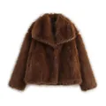 Detailed view of a brown faux fur coat showcasing soft plush texture and wide lapel - Brown