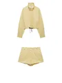 Fashionable two-piece set featuring a yellow polka dot seersucker jacket and mini shorts - XS / Top And Bottom / Yellow