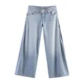 Detail of light blue wide-leg denim jeans with unique side split design for women - XS / Bottoms / Light Blue