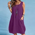 Detailed view of women's purple cotton linen loose summer dress with buttons and pockets - S / Dresses / Purple