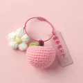 Detailed view of crocheted peach and flower keychain with teacher gift tag - Wire Ring Single / Peach and Flower with Pink Wire Ring