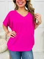 Detail view of a hot pink V-neck ribbed short sleeve T-shirt for women in a casual loose fit - Rose Red