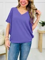Casual purple V-neck ribbed short sleeve T-shirt for women in a cozy home setting - Purple