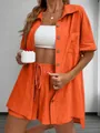 Stijlvolle oranje zomerse set met shirt met korte mouwen en korte broek met trekkoord. - S / Boven- En Onderstuk / Oranje