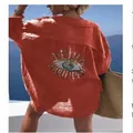 Orangefarbenes Damen-Freizeithemd mit Pailletten-Evil-Eye-Design auf der Rückseite - 3XL / Oberteile / Orange