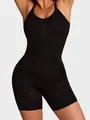 Detail of black seamless bodysuit shapewear with tummy control and butt lifting feature - S / Jumpsuits / Black