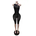 Close-up view of a black one-shoulder shiny tight jumpsuit for yoga and fitness - M / Jumpsuits / Black