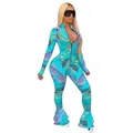 Full body view of a slim fit tropical print jumpsuit with flared fishtail hem detail - S / Lake Green