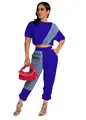 Detailed view of royal blue two-piece casual set with denim patchwork and pink handbag - S / Top And Bottom / Sapphire Blue