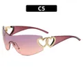 Trendy Y2K rimless sunglasses featuring heart cutouts and pink orange gradient lenses C5 - Rimless Heart Decor (C5) / Purple Frame Purple Pink Lens