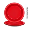 Detailed view of red disposable paper plates measuring 18cm or 7.09 inches for parties. - 7 Inch Plate / Set of 12 / Ruby Red