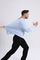 Men's high elasticity seamless long-sleeve shirt in light blue showing extreme stretch - 40/XS / Tops / Light Blue