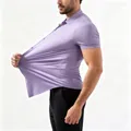 Purple high-stretch seamless men's short-sleeve shirt showing fabric elasticity - XL / Tops / T-Shirts / Purple
