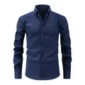 Classic men's navy blue long sleeve shirt featuring a unique wavy textured striped fabric - XS / Tops / Long Sleeve / Navy Blue