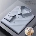 Premium light blue men's wool long-sleeve shirt with smooth texture and formal collar. - 38 / Tops / Light Blue (Item YM051-23)