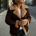 Street style shot of a brown suede shearling jacket with warm wool lapels and buckles. - Red Brown