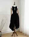 Elegant black sleeveless dress with chest cutout and asymmetrical pleated skirt detail - Black