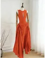 Detailed view of an orange sleeveless pleated dress with hollow-out design - S / Dresses / Orange