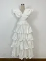 Elegant white multi-layered pleated tiered ruffle banquet dress displayed on mannequin - White