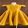 Elegant yellow V-neck satin party dress featuring a unique pleated petal hem design - Yellow