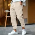Detailed view of men's breathable linen cotton joggers with elastic drawstring waist - S / Khaki