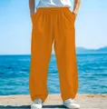 Stylish men's loose drawstring beach pants in vibrant orange featuring side pockets - S / Bottoms / Orange