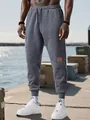 Pantalones de chándal ajustados de forro polar gris para hombre con cordón y puños - XS / Bottoms / Gris oscuro
