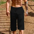Detailed view of breathable black linen cotton cropped pants for men in outdoor nature - S / Bottoms / Black