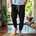 Breathable black cotton linen joggers for men with drawstring waist and tapered cuffs - S / Bottoms / Black