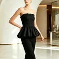 Elegant black strapless peplum top featuring a ruffle hem and French retro design for women - S / Tops / Black