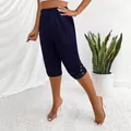 Women's navy blue casual capri pants featuring a stylish button hem detail and elastic waist - S / Bottoms / Dark Blue