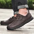 Modische braune Herren-Freizeitschuhe aus Leder mit Schnürung für bequemen Outdoor-Einsatz - 38 / Dunkelbraun