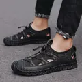 Ademende zwarte outdoorsandalen voor heren met bovenwerk van mesh-leer en veters - 39 / Zwart